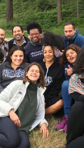 Team members from the Hollyhock leadership program smiling to the camera