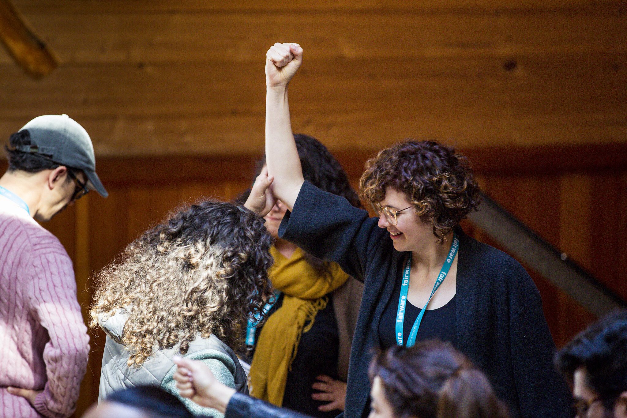 Woman raising her fist and smiling