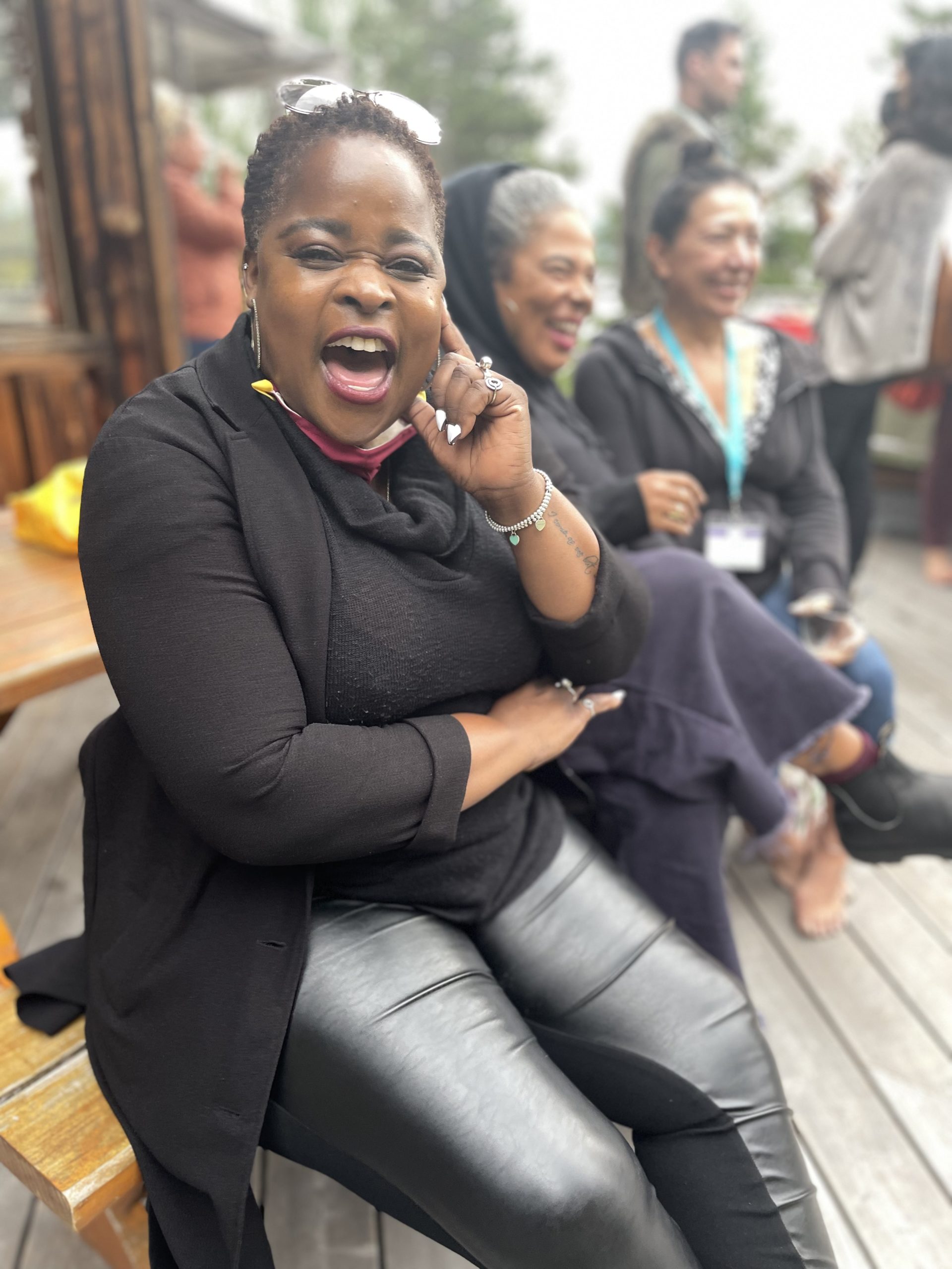 Laughing woman student from the SVI Hollyhock program